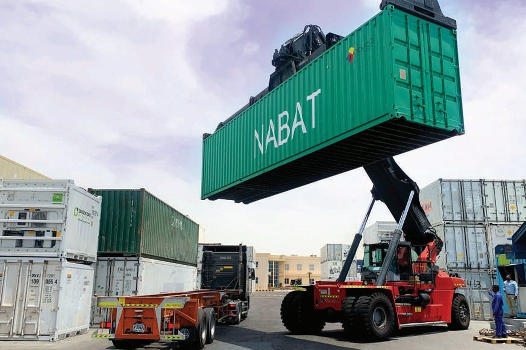 A Nabat container farm being lifted for delivery